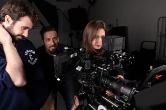 Students film using a RED camera