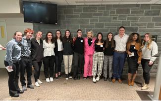 A group of student participants is gathered for a photo at the 2023 Case Competition